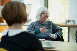 Older adult and family member discussing care planning at home