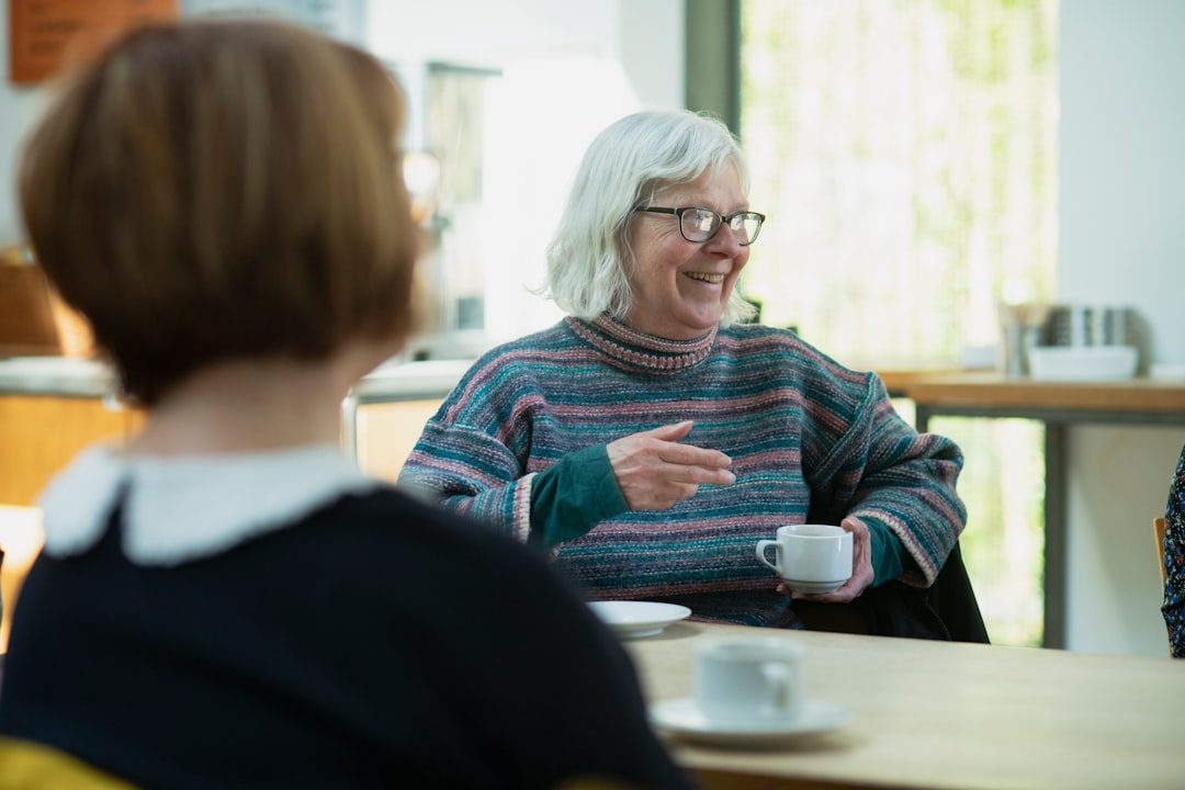 Older adult and family member discussing care planning at home